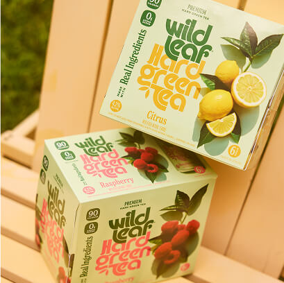 Packages of Citrus and Raspberry Wild Leaf Green Tea